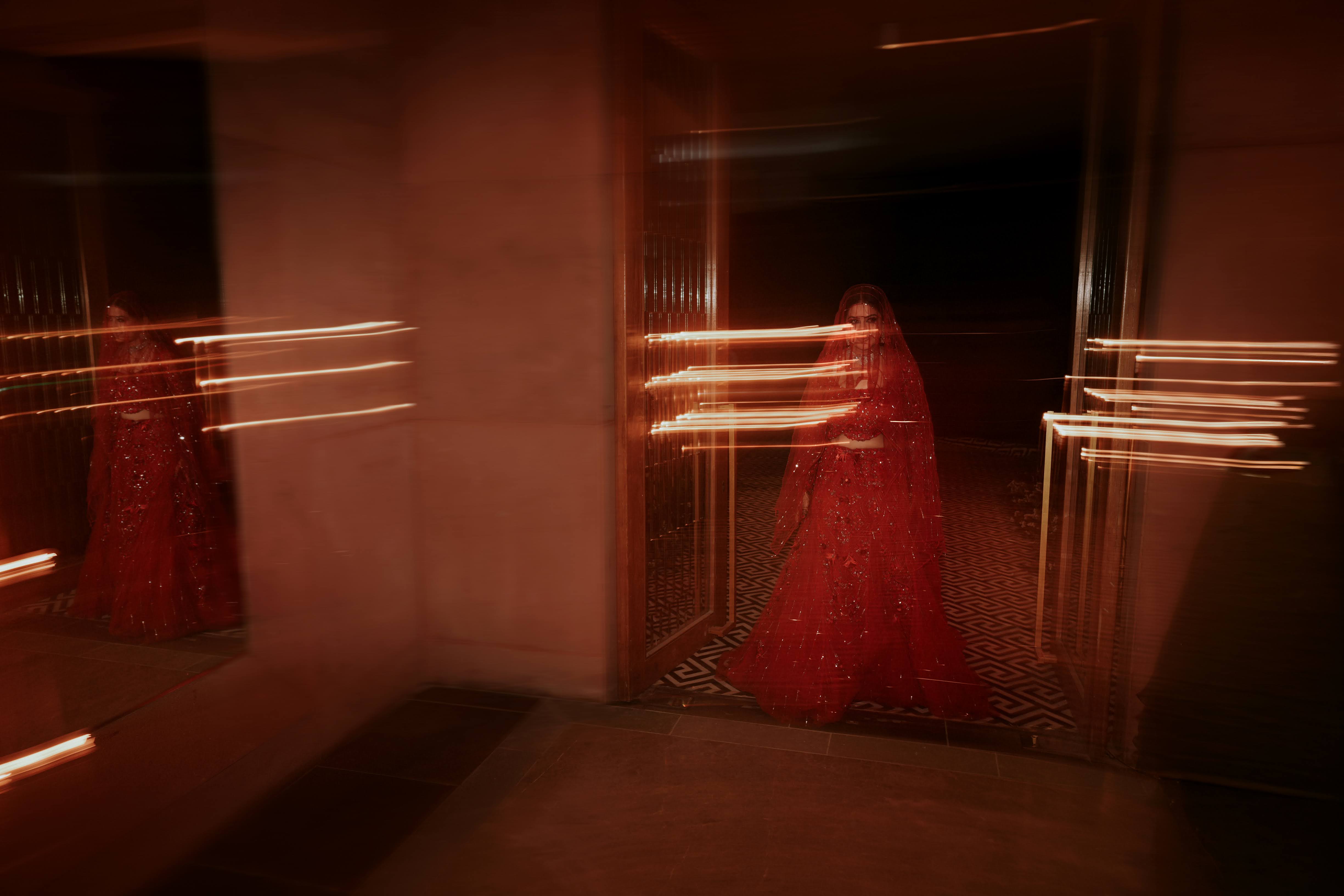 Bride in red at a wedding reception