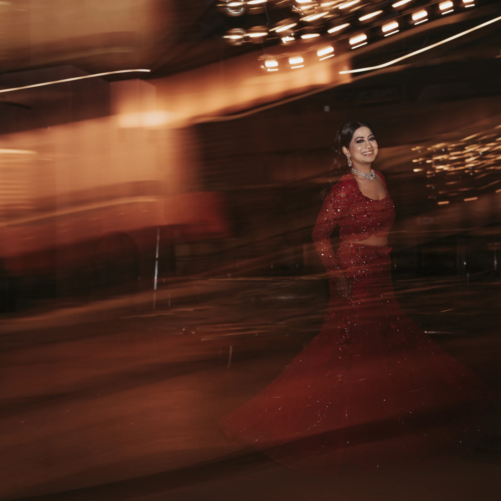Bride in red, in motion