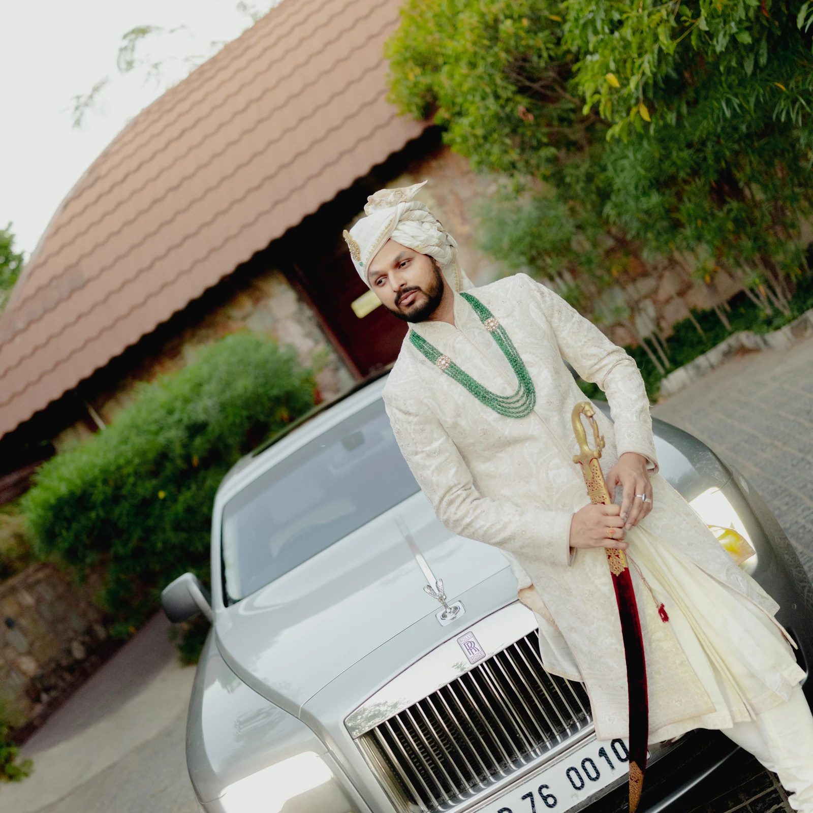 Groom with a vintage car