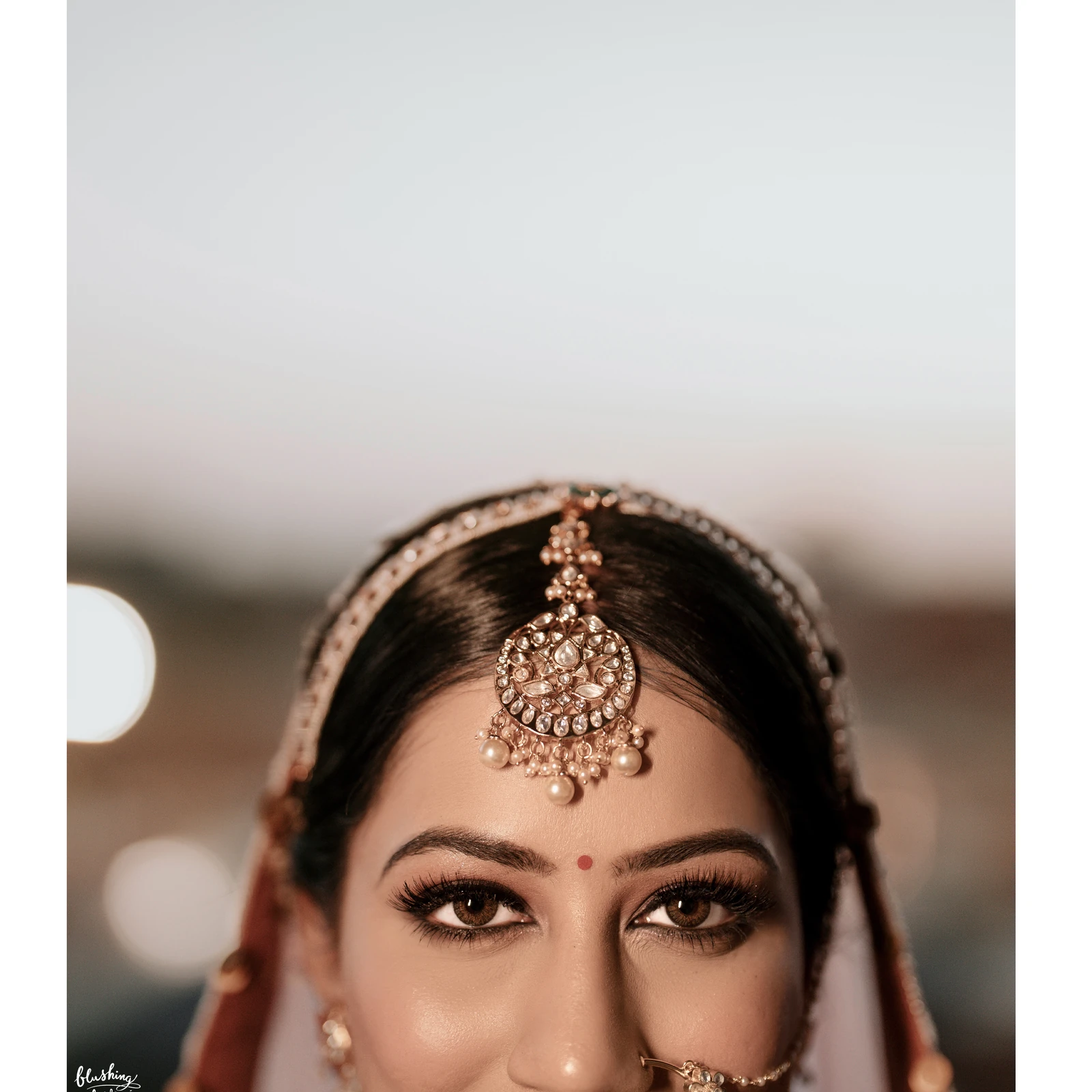 Bride wearing a maang tikka