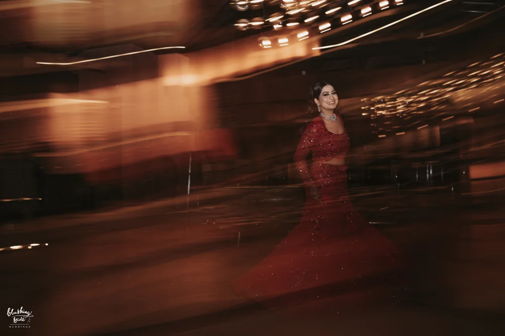Bride in red, photographed in motion