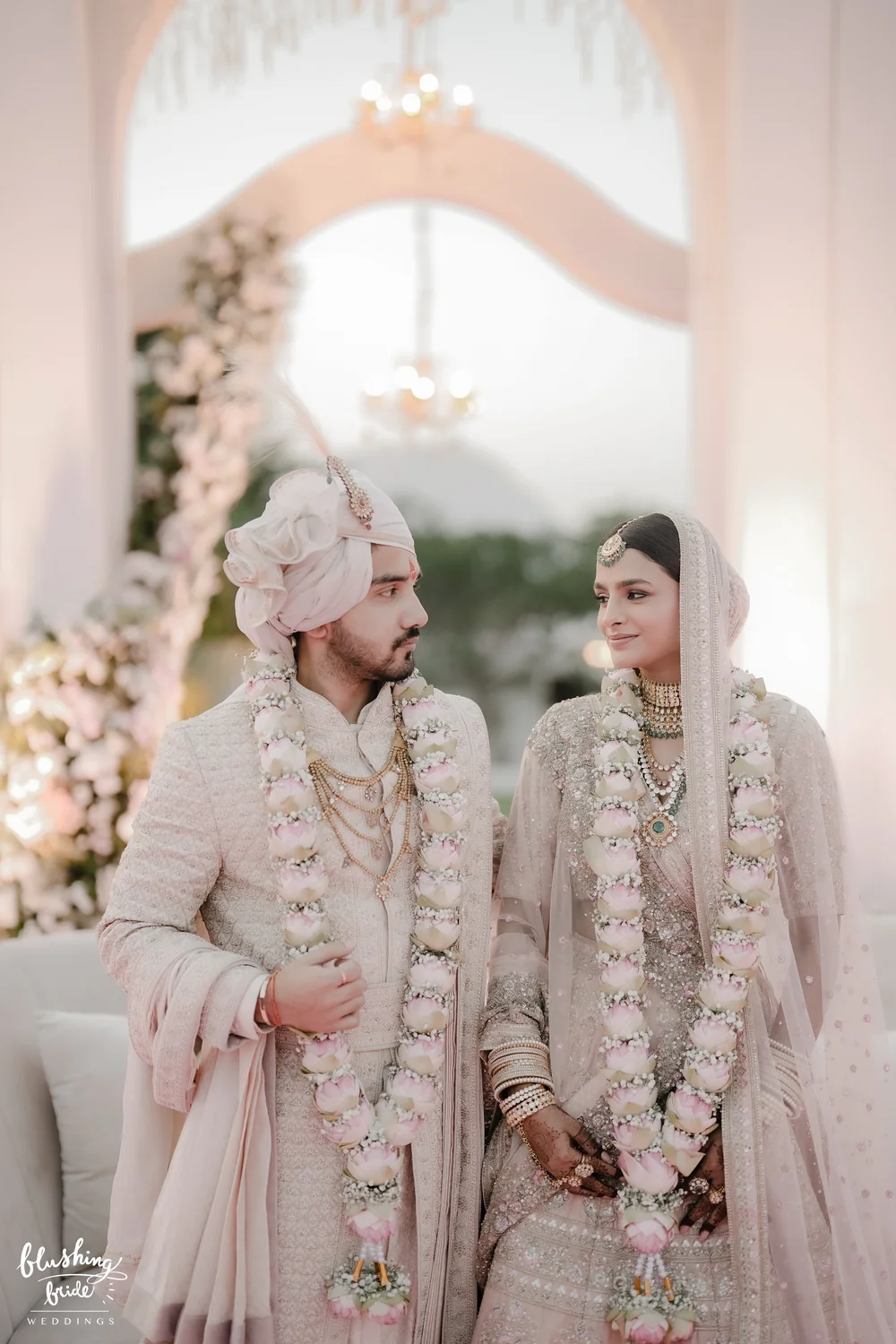 Couple in wedding garlands